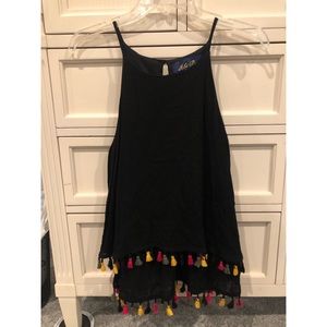 flowy tank top with cute fringes on the bottom